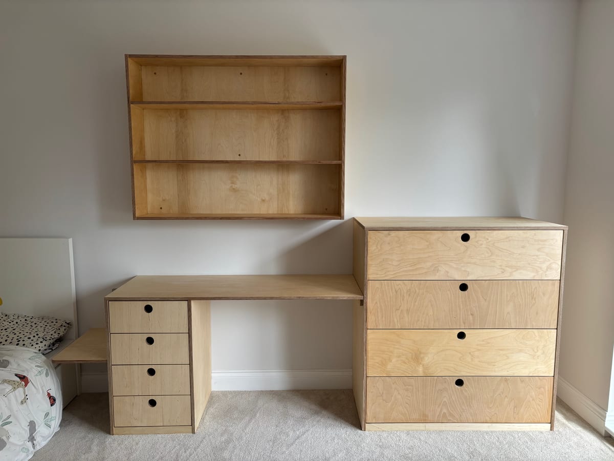 Birch plywood fitted desk, drawer unit and wall shelving in a study